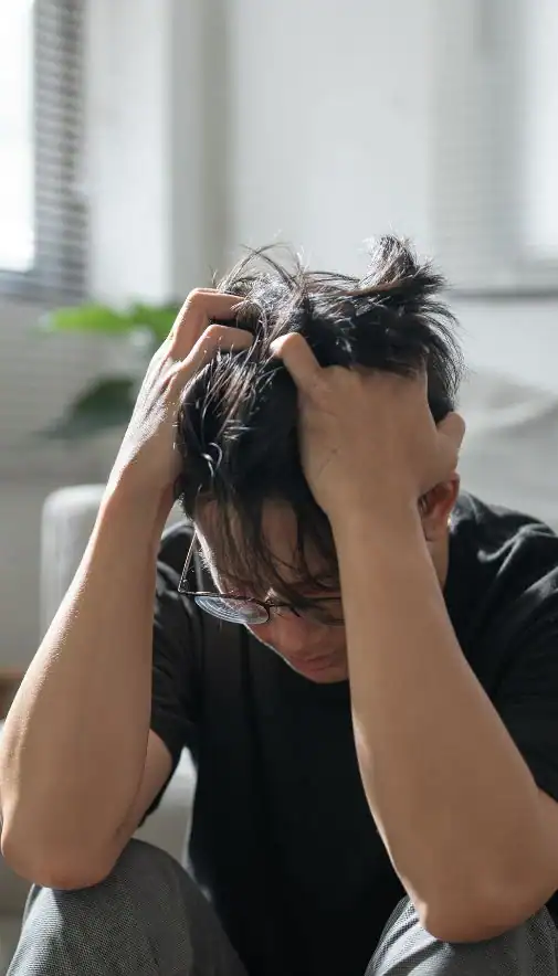 Image of upset man because of erectile dysfunction symptoms Brighton & Hove