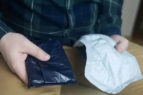 image of man holding stool incontinence Brighton & Hove products